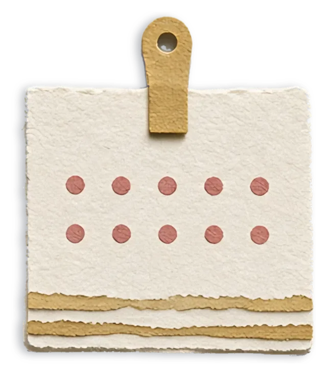 A cut-paper wall calendar with seed packets